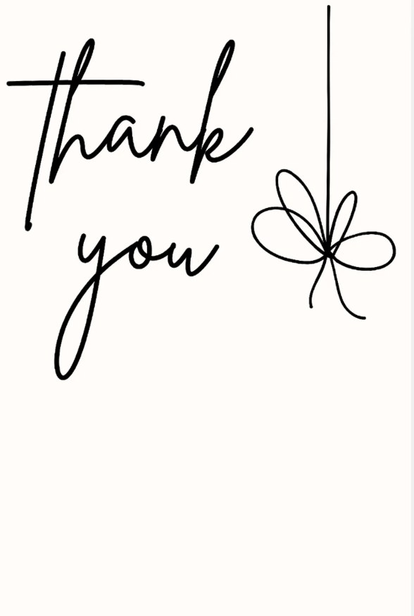 A cream card with the words thank you in handwriting and a hanging bow